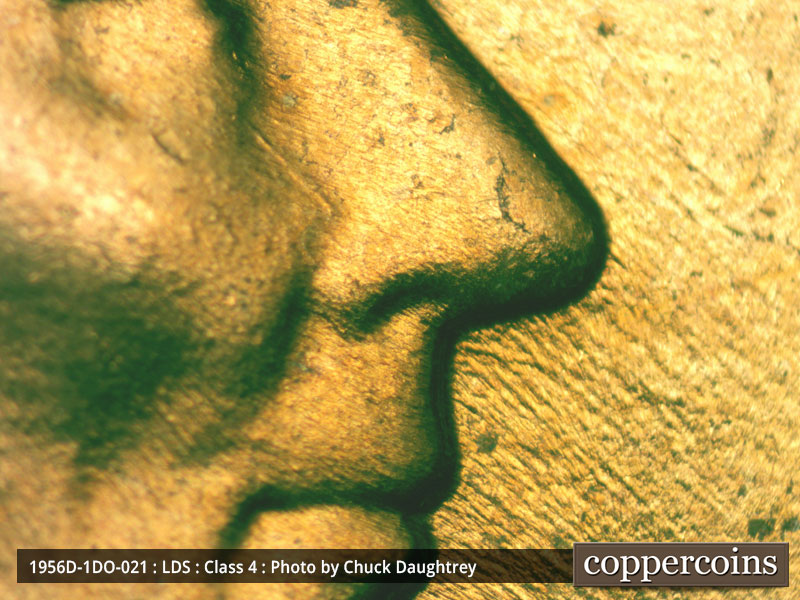 Die-stage C marker on 1956D•1DO•021 (1956 Doubled Die Obverse).
