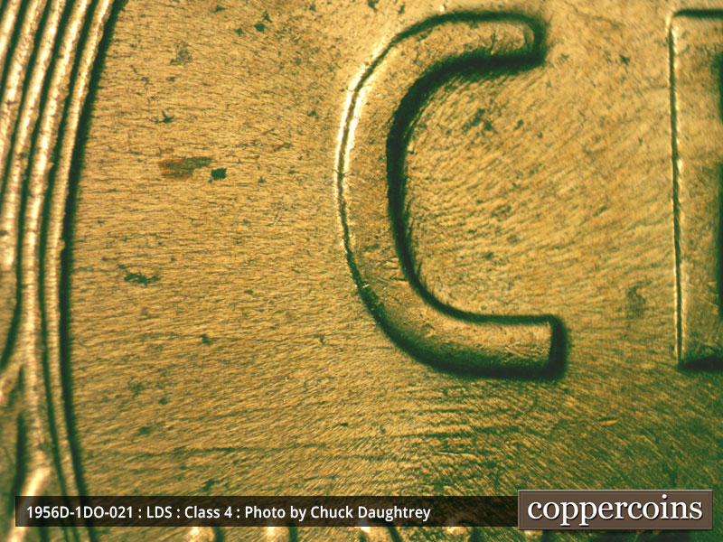 Die-stage C marker on 1956D•1DO•021 (1956 Doubled Die Obverse).