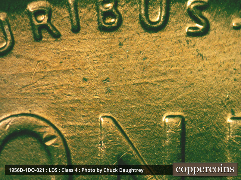 Die-stage C marker on 1956D•1DO•021 (1956 Doubled Die Obverse).