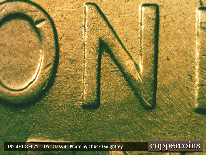 Die-stage C marker on 1956D•1DO•021 (1956 Doubled Die Obverse).