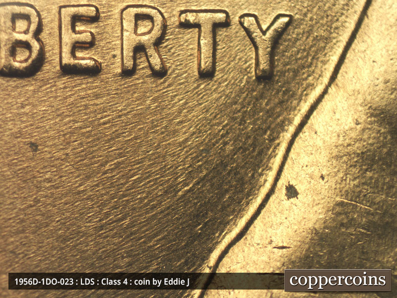 Die-stage C marker on 1956D•1DO•023 (1956 Doubled Die Obverse).