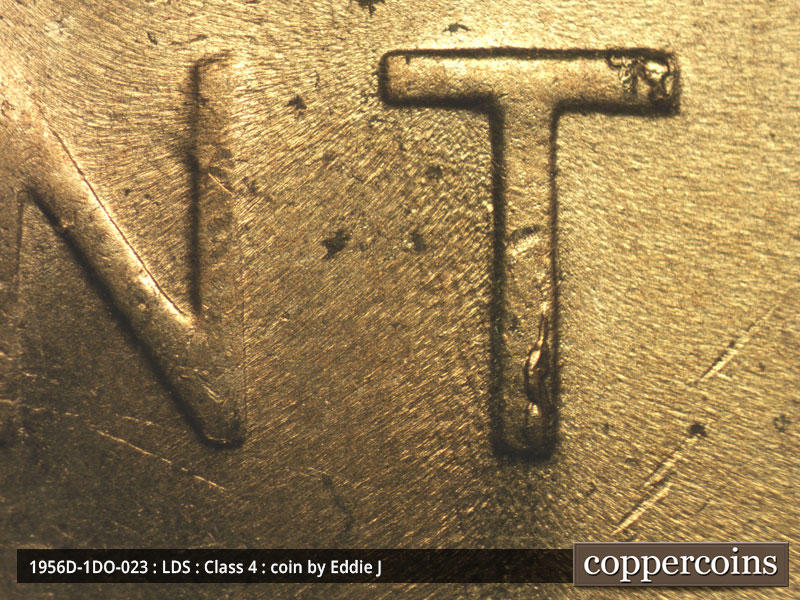 Die-stage C marker on 1956D•1DO•023 (1956 Doubled Die Obverse).