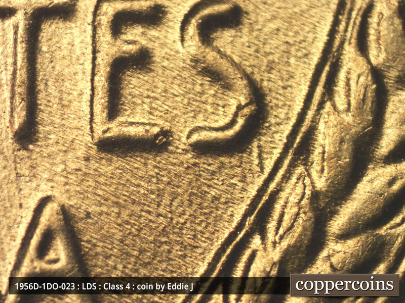 Die-stage C marker on 1956D•1DO•023 (1956 Doubled Die Obverse).