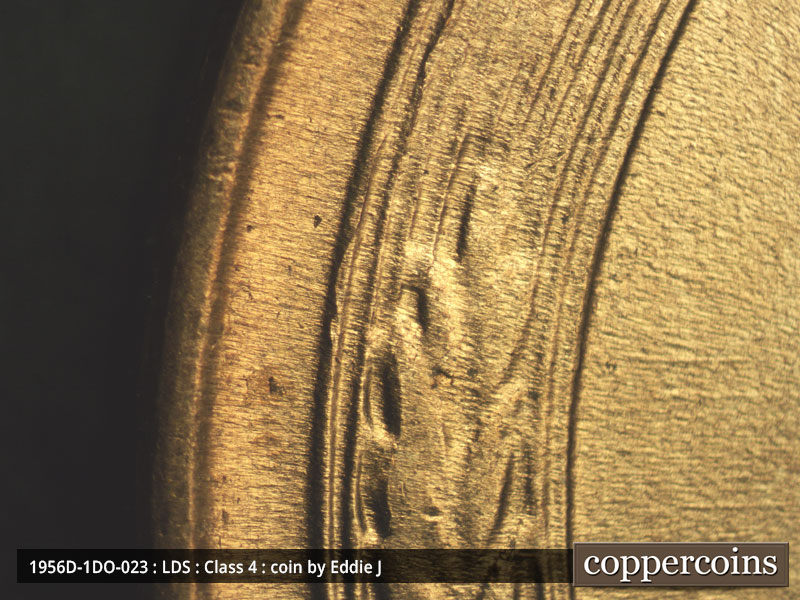 Die-stage C marker on 1956D•1DO•023 (1956 Doubled Die Obverse).