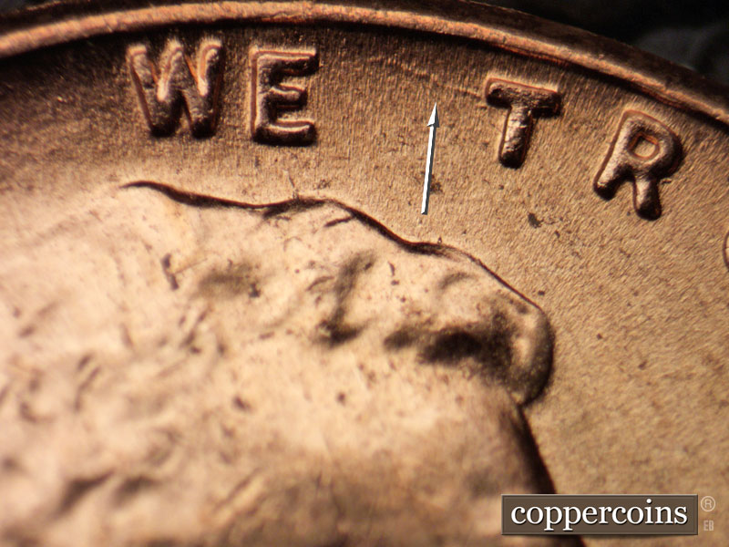 Die-stage C marker on 1956D•1DO•025 (1956 Doubled Die Obverse).