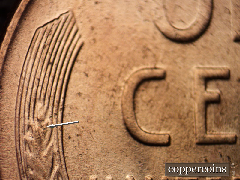 Die-stage C marker on 1956D•1DO•025 (1956 Doubled Die Obverse).