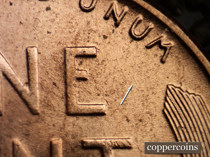 Die-stage C marker on 1956D•1DO•025 (1956 Doubled Die Obverse).