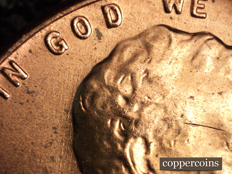 Die-stage B marker on 1956D•1DO•027 (1956 Doubled Die Obverse).