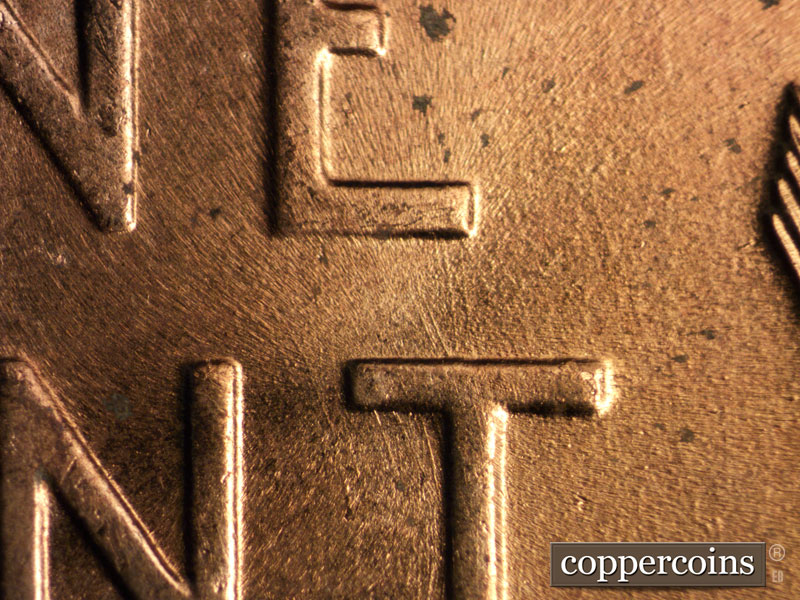 Die-stage B marker on 1956D•1DO•027 (1956 Doubled Die Obverse).