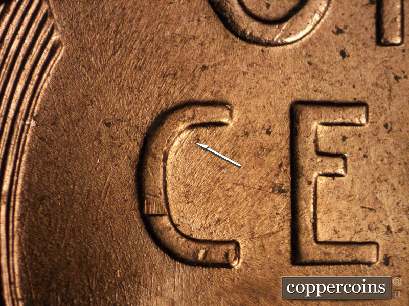 Die-stage B marker on 1956D•1DO•027 (1956 Doubled Die Obverse).