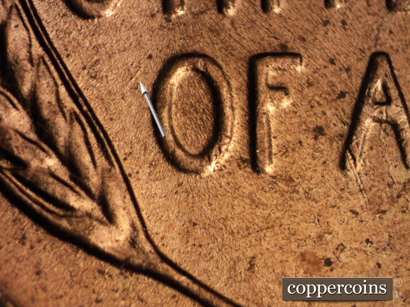 Die-stage B marker on 1956D•1DO•027 (1956 Doubled Die Obverse).