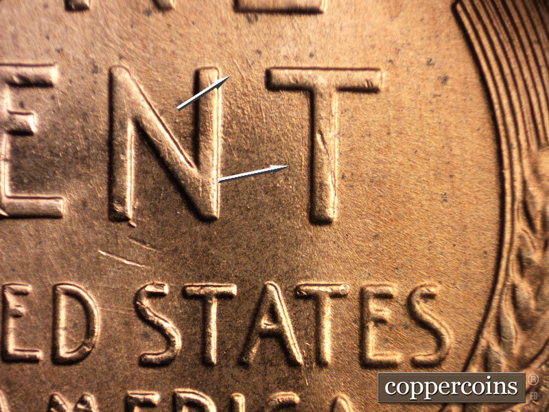 Die-stage B marker on 1956D•1DO•028 (1956 Doubled Die Obverse).