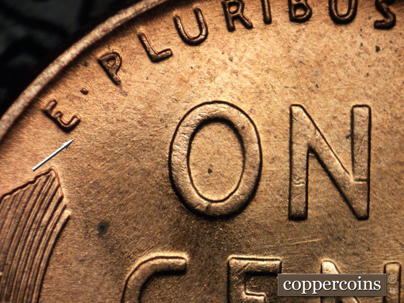 Die-stage B marker on 1956D•1DO•029 (1956 Doubled Die Obverse).