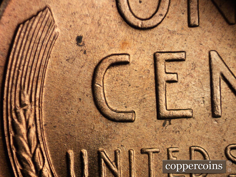 Die-stage B marker on 1956D•1DO•029 (1956 Doubled Die Obverse).