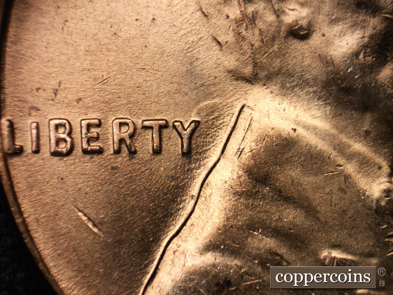 Die-stage C marker on 1956D•1DO•030 (1956 Doubled Die Obverse).