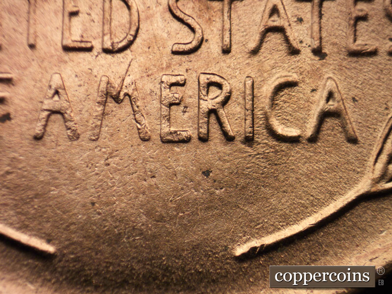 Die-stage C marker on 1956D•1DO•030 (1956 Doubled Die Obverse).