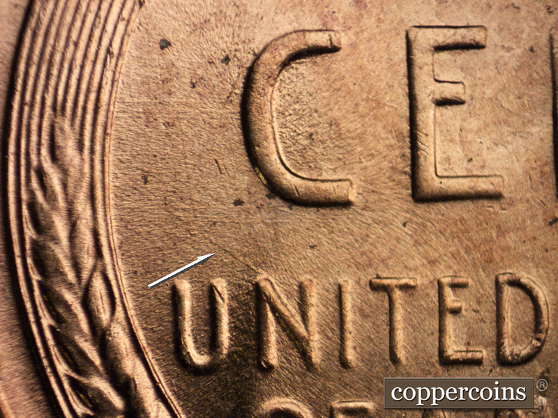 Die-stage C marker on 1956D•1DO•030 (1956 Doubled Die Obverse).