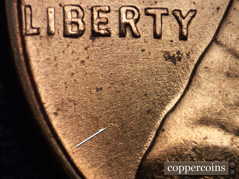 Die-stage B marker on 1956D•1DO•031 (1956 Doubled Die Obverse).