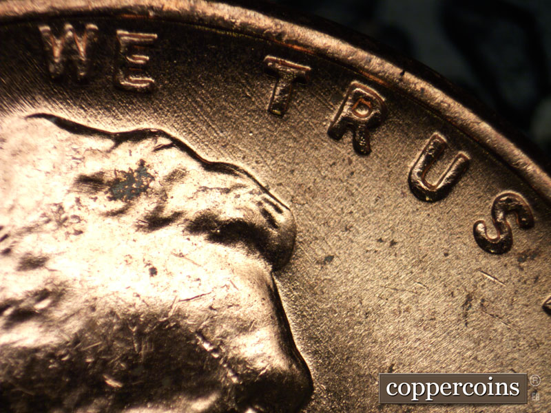 Die-stage B marker on 1956D•1DO•031 (1956 Doubled Die Obverse).