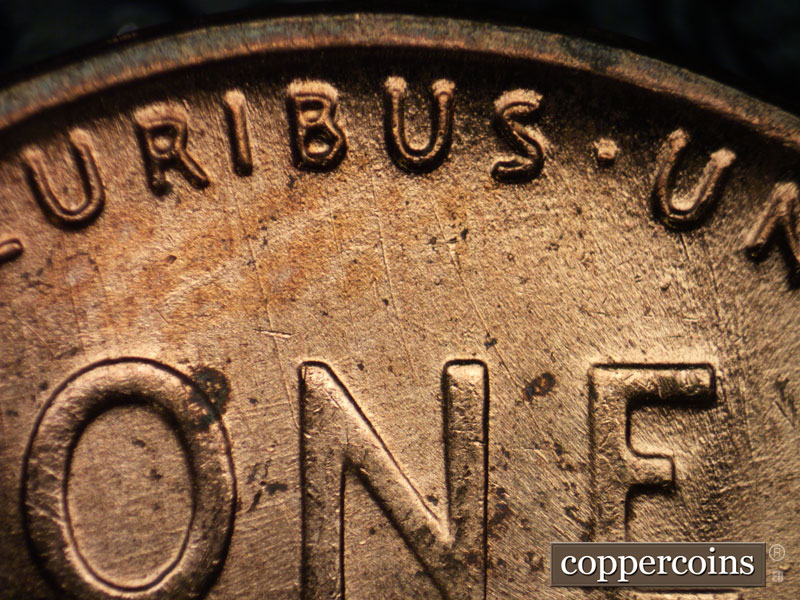 Die-stage B marker on 1956D•1DO•031 (1956 Doubled Die Obverse).