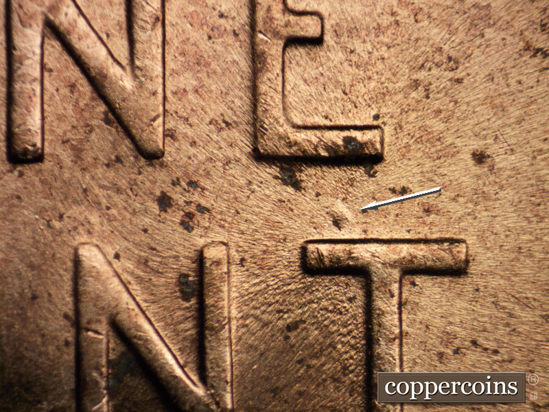Die-stage B marker on 1956D•1DO•032 (1956 Doubled Die Obverse).