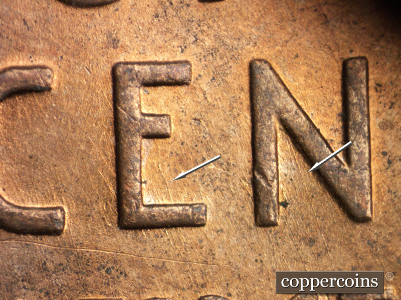 Die-stage B marker on 1956D•1DO•033 (1956 Doubled Die Obverse).