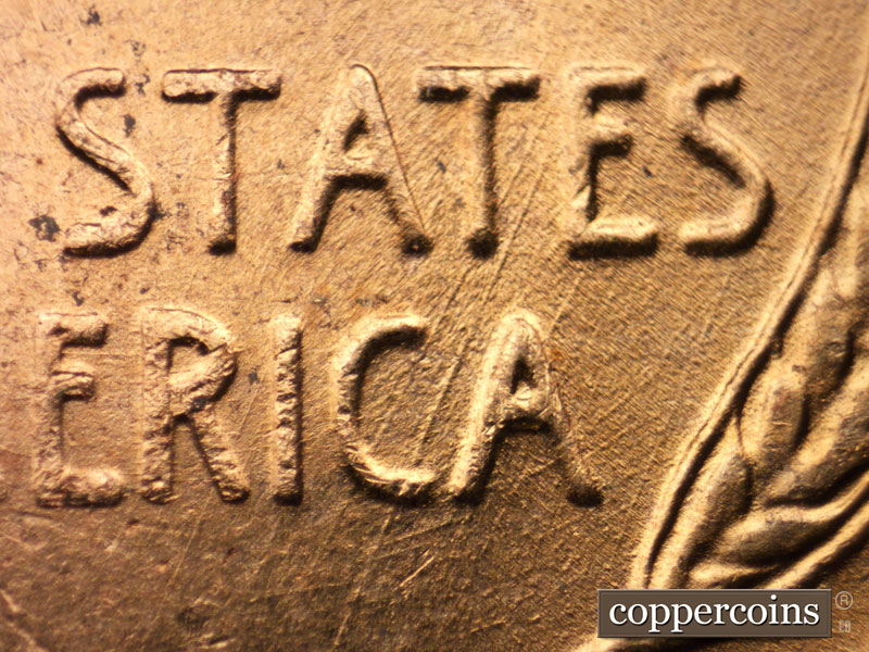 Die-stage B marker on 1956D•1DO•035 (1956 Doubled Die Obverse).
