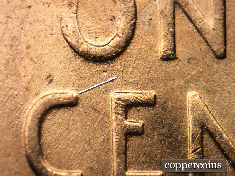 Die-stage B marker on 1956D•1DO•035 (1956 Doubled Die Obverse).
