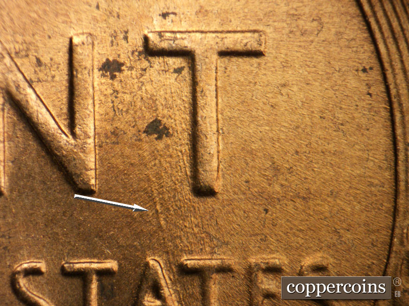 Die-stage B marker on 1956D•1DO•036 (1956 Doubled Die Obverse).