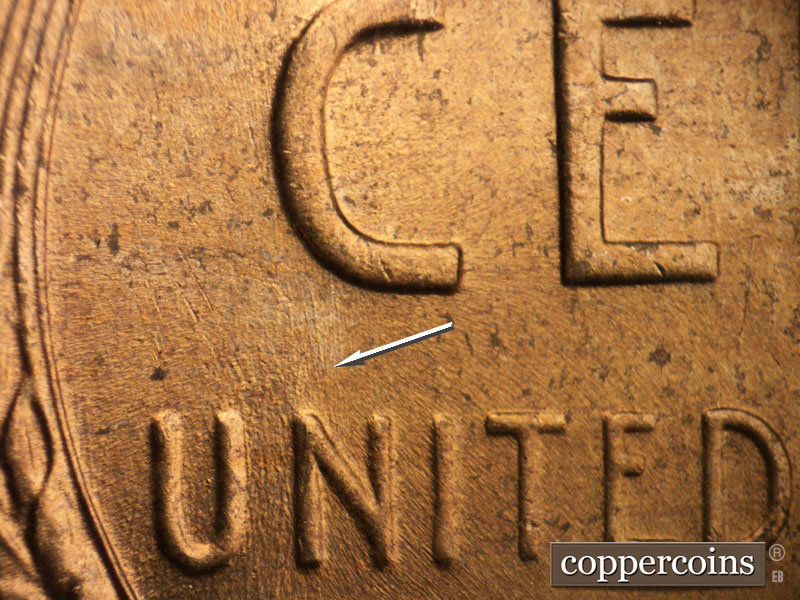 Die-stage B marker on 1956D•1DO•036 (1956 Doubled Die Obverse).