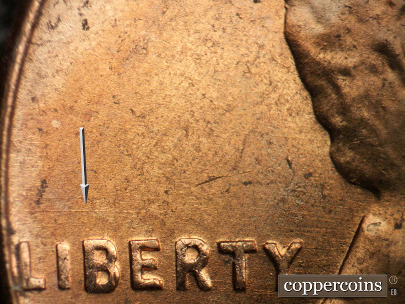 Die-stage B marker on 1956D•1DO•037 (1956 Doubled Die Obverse).