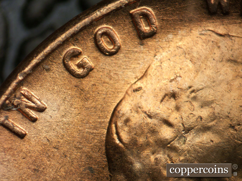 Die-stage B marker on 1956D•1DO•037 (1956 Doubled Die Obverse).