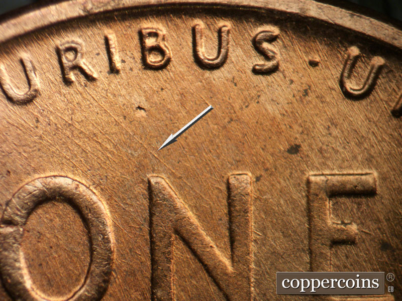 Die-stage B marker on 1956D•1DO•037 (1956 Doubled Die Obverse).