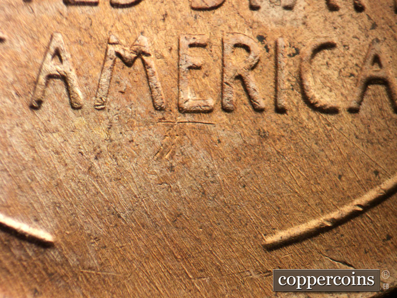 Die-stage B marker on 1956D•1DO•037 (1956 Doubled Die Obverse).