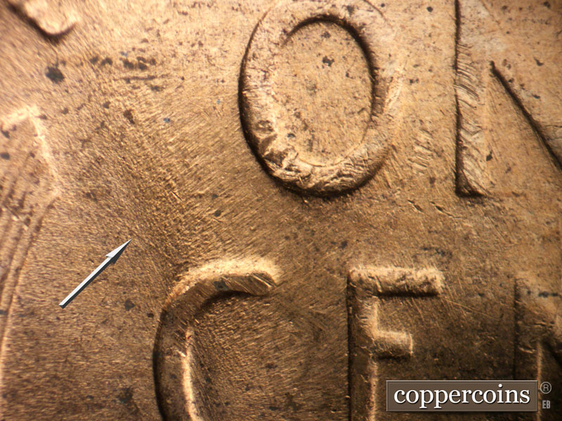 Die-stage B marker on 1956D•1DO•039 (1956 Doubled Die Obverse).