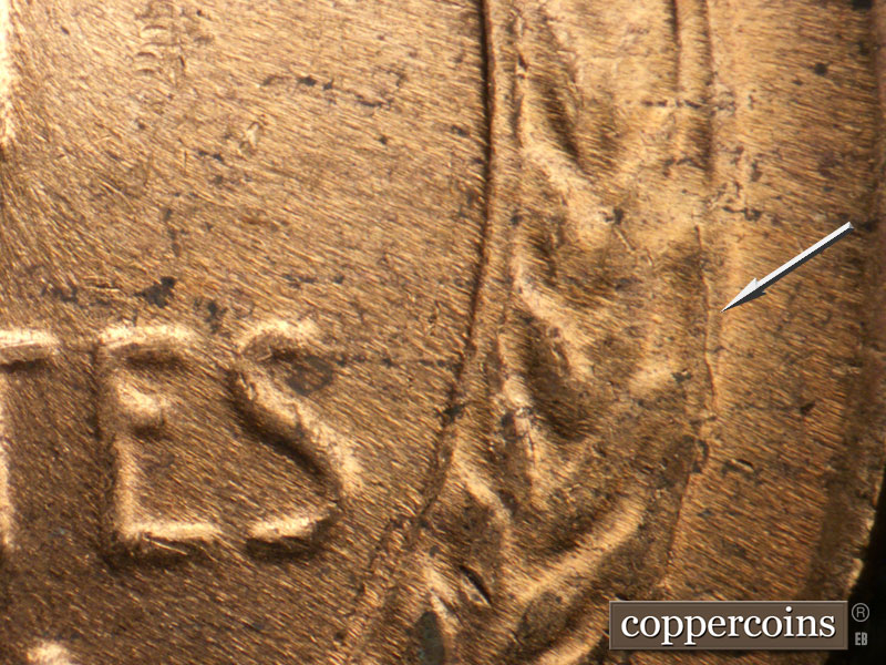 Die-stage B marker on 1956D•1DO•039 (1956 Doubled Die Obverse).