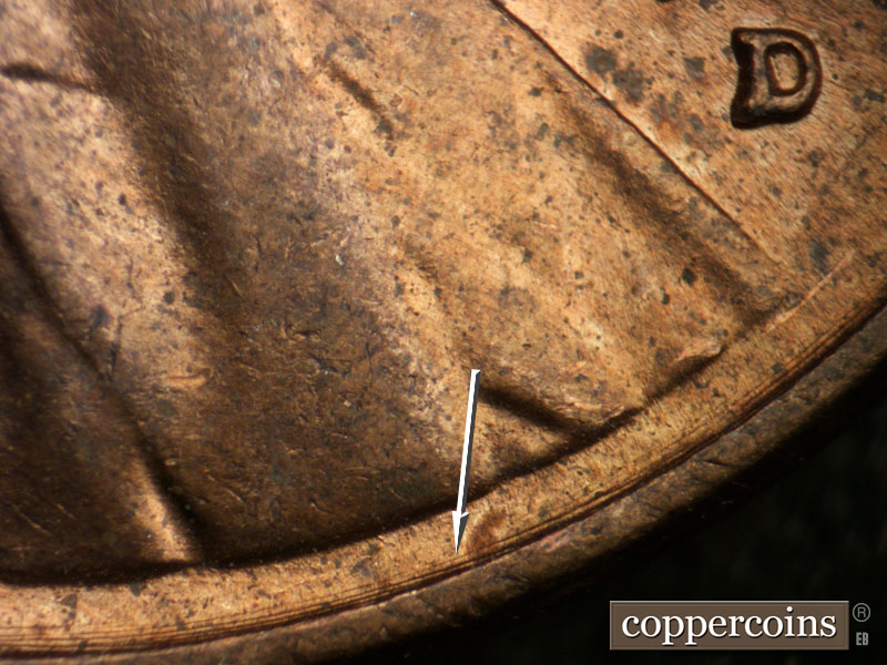 Die-stage B marker on 1956D•1DO•041 (1956 Doubled Die Obverse).