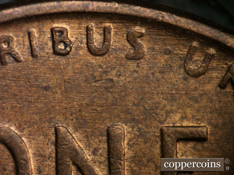 Die-stage B marker on 1956D•1DO•041 (1956 Doubled Die Obverse).