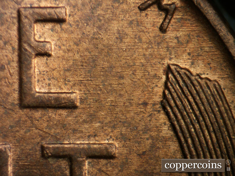 Die-stage B marker on 1956D•1DO•041 (1956 Doubled Die Obverse).