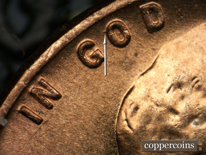 Die-stage B marker on 1956D•1DO•042 (1956 Doubled Die Obverse).