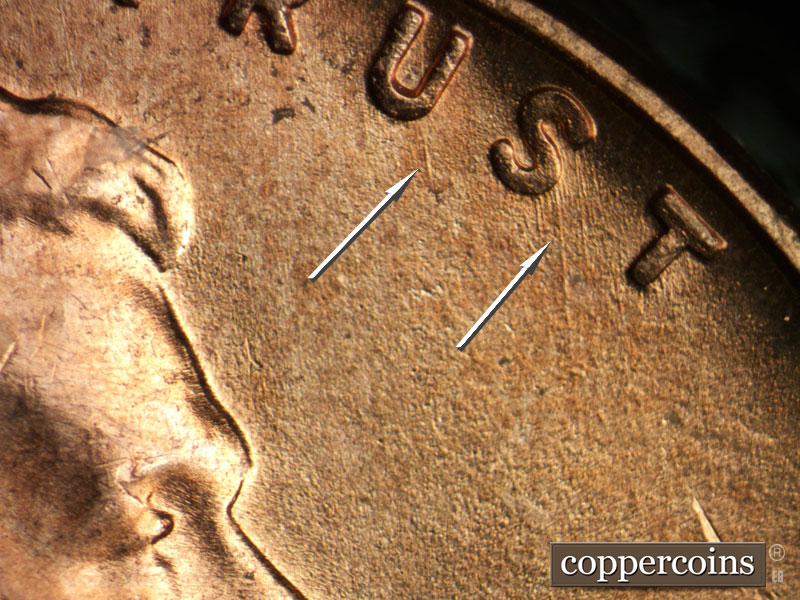 Die-stage B marker on 1956D•1DO•043 (1956 Doubled Die Obverse).