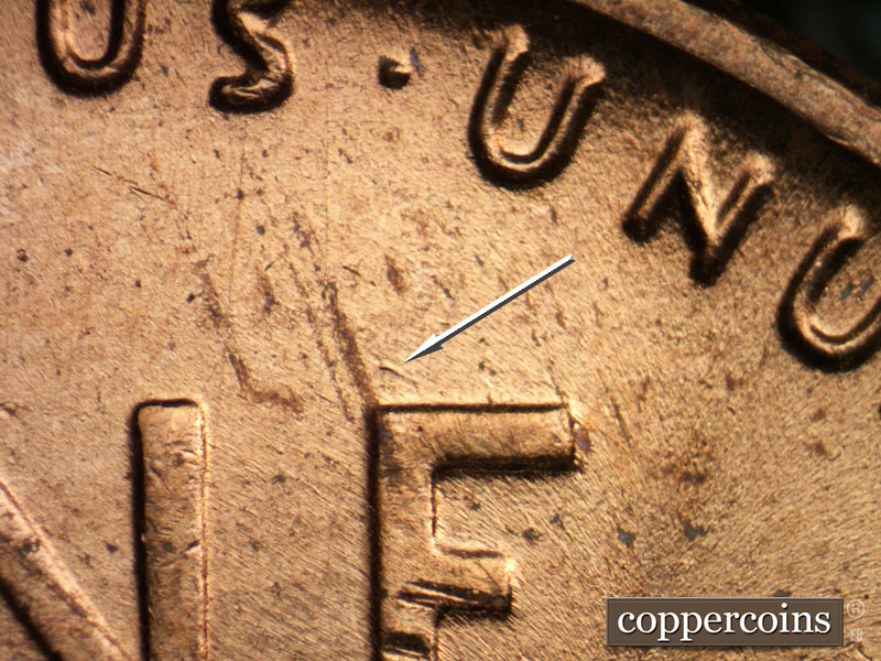 Die-stage B marker on 1956D•1DO•043 (1956 Doubled Die Obverse).
