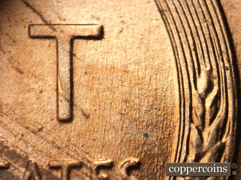 Die-stage B marker on 1956D•1DO•043 (1956 Doubled Die Obverse).
