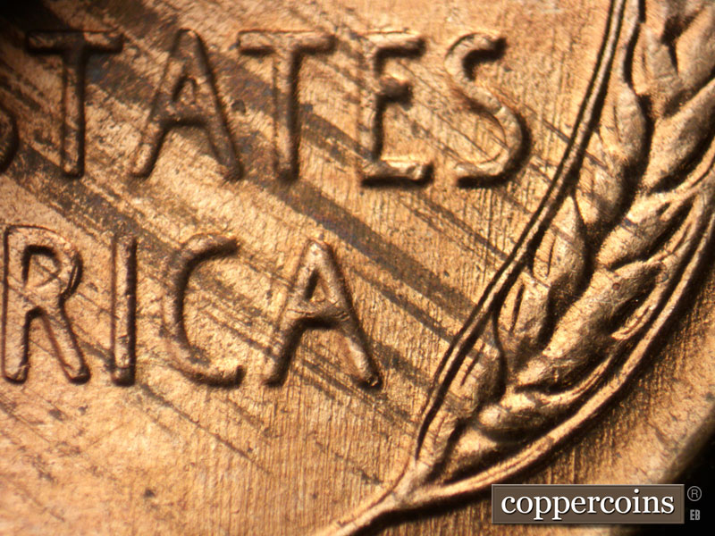 Die-stage B marker on 1956D•1DO•043 (1956 Doubled Die Obverse).