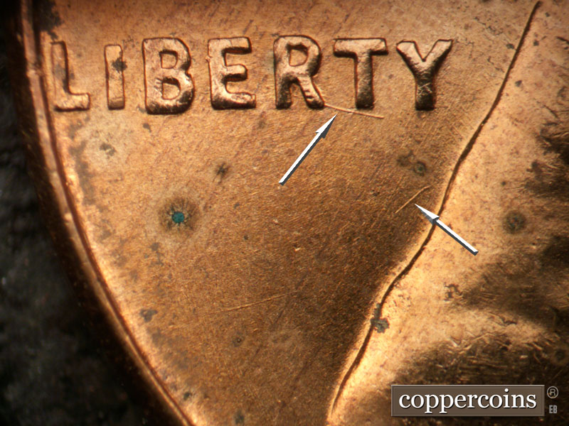 Die-stage B marker on 1956D•1DO•044 (1956 Doubled Die Obverse).