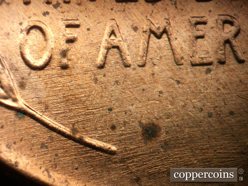 Die-stage B marker on 1956D•1DO•044 (1956 Doubled Die Obverse).