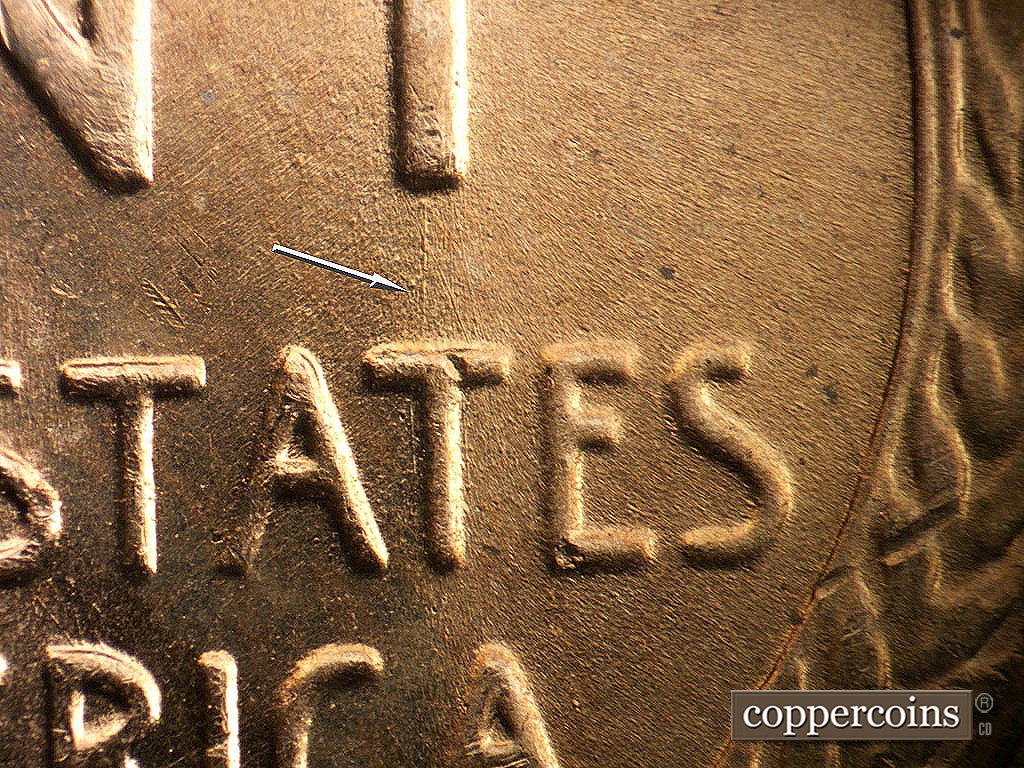 Die-stage B marker on 1956D•1DO•045 showing N/S die scratch connects T in CENT to second T in STATES.