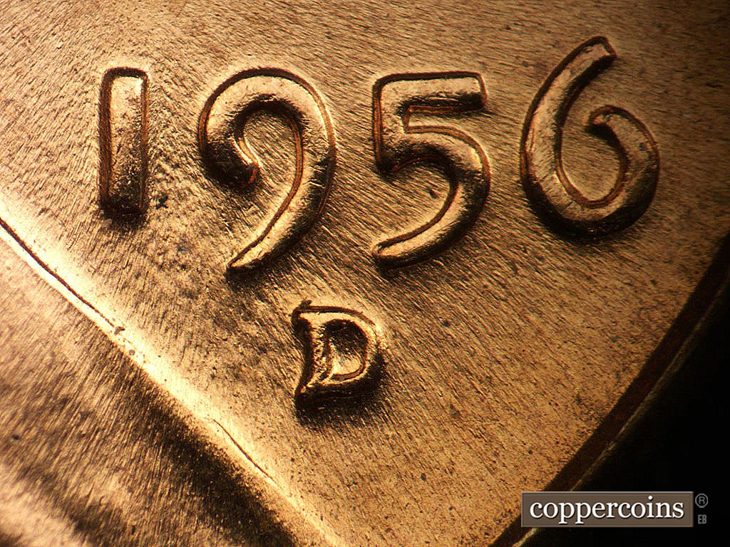Die-stage B marker on 1956D•1DO•048 showing Worn SE die scratches through date.