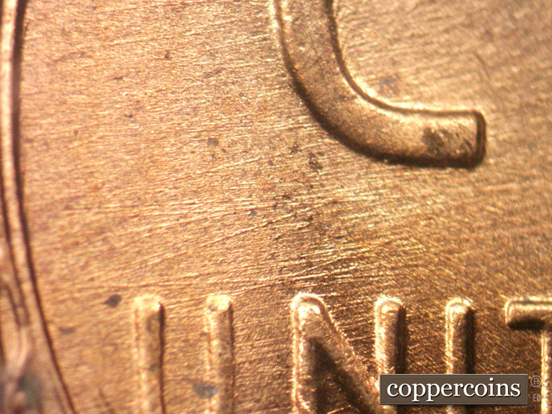 Die-stage C marker on 1956D•1MM•001 (1956 Repunched Mint Mark).