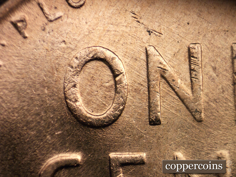 Die-stage A marker on 1956D•1MM•007 (1956 Repunched Mint Mark).